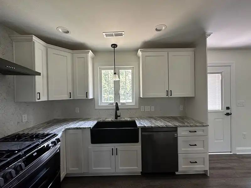 Modern kitchen with new white cabinets